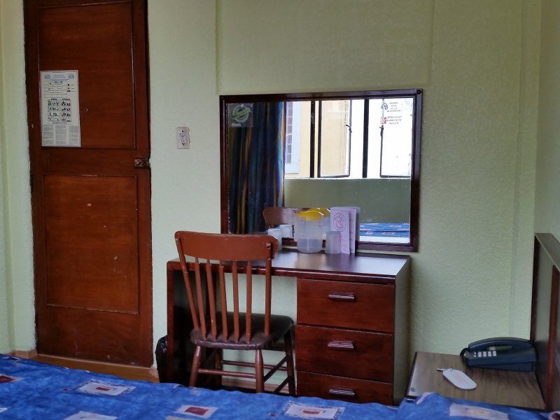 hotel room desk and mirror.