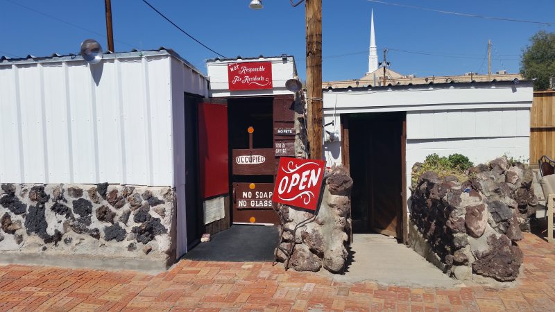 Two doors leading to soaking rooms at a bathing resort in Truth or Consequences, New Mexico.