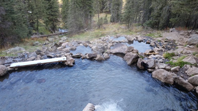 Several steamy, clear pools from one of the wilderness hot springs New Mexico is famous for.
