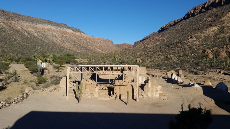adobe ruins with steel awning