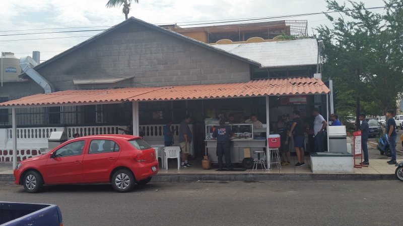Customers lined up in front of Tacos de Pescado El Estadio, La Paz, Baja Sur, Mexico.