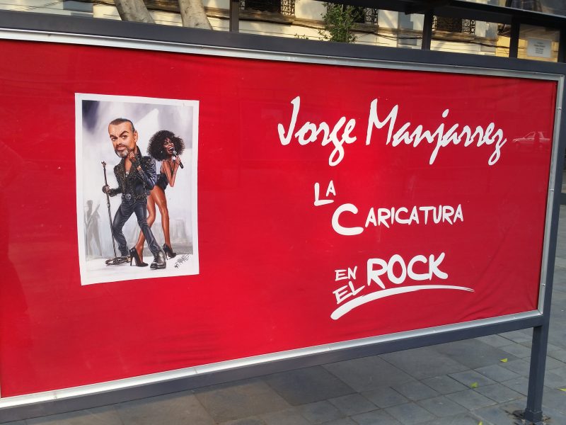 A showcase advertising an exhibit by the artist Jorge Manjarrez in Mexico City.