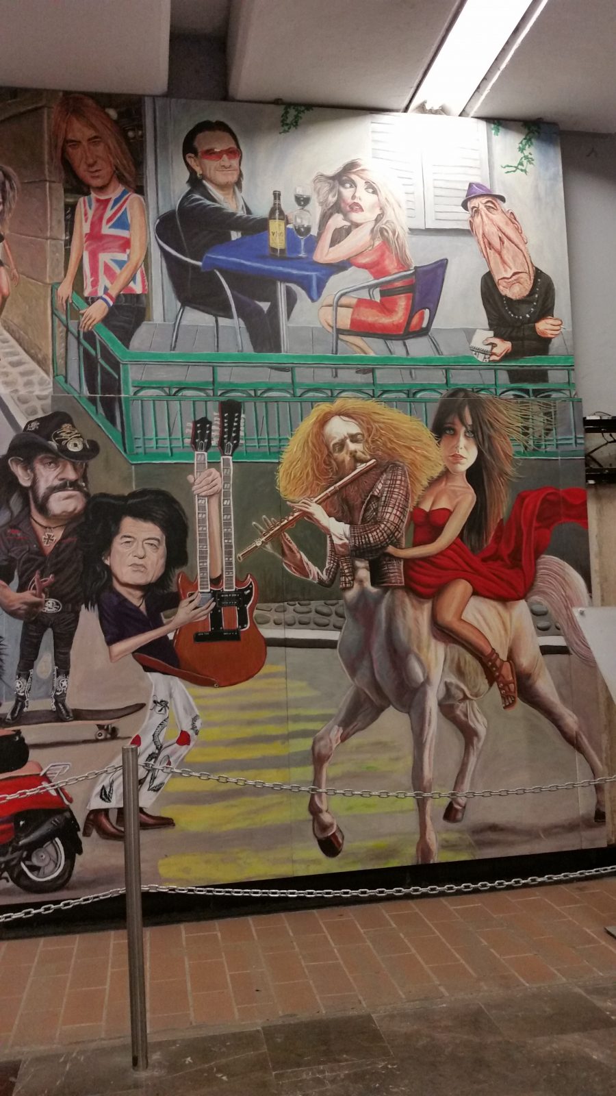A view of the famous rock 'n roll murals in Auditorio Metro Station in Mexico City painted by artist Jorge Manjarrez showing Jimmy Page.