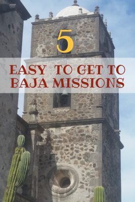 stone mission church bell tower with cactus