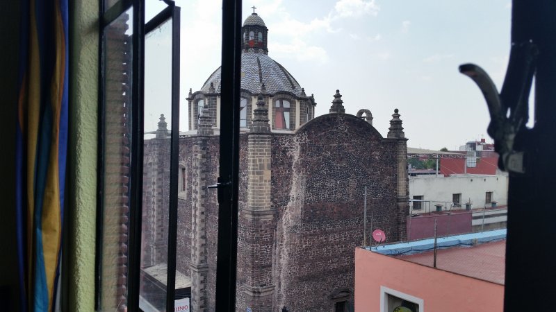 View of old church from hotel window, mexico city.