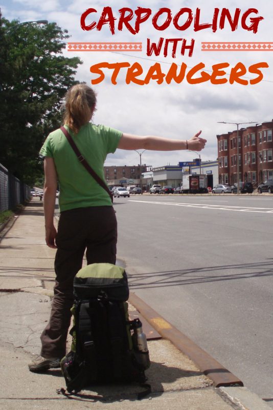 woman with backpack hitchhiking on the side of the road.