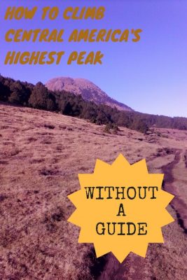 view from a field looking towards a mountain