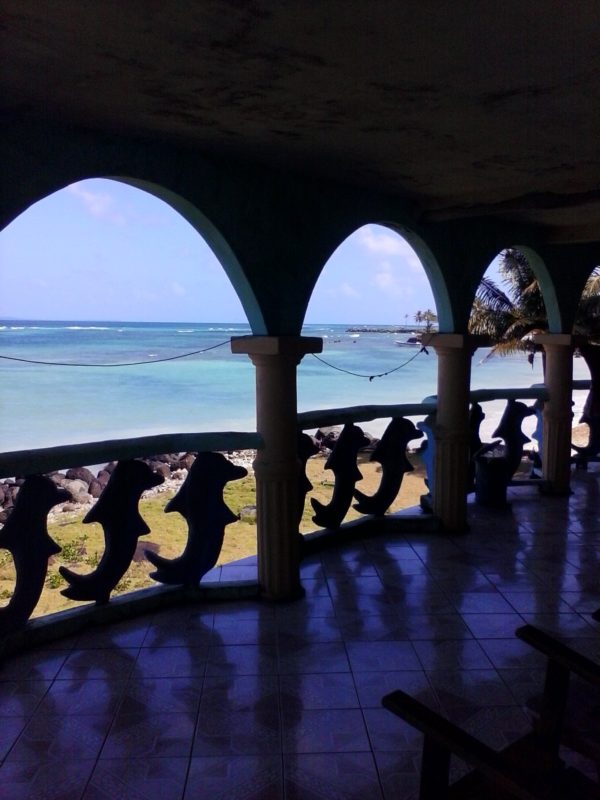 Exterior of the turquoise-colored Beach View Hotel on Big Corn Island off the coast of Nicaragua.