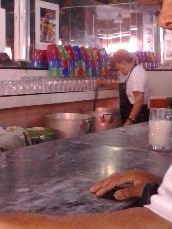 People drinking in a pulqueria in Mexico City.