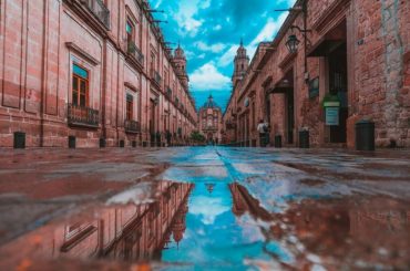colonial pink sandstone buildings in Mexico.